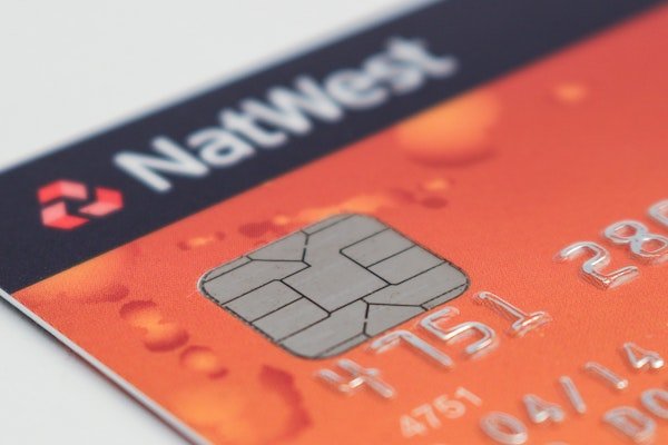 A secure pay RF IC embedded in a card